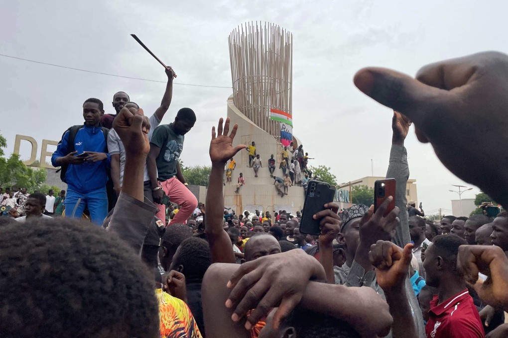 Supporters of the Nigerien defence and security forces gather during a demonstration outside the national assembly in Niamey last week. Photo: AFP