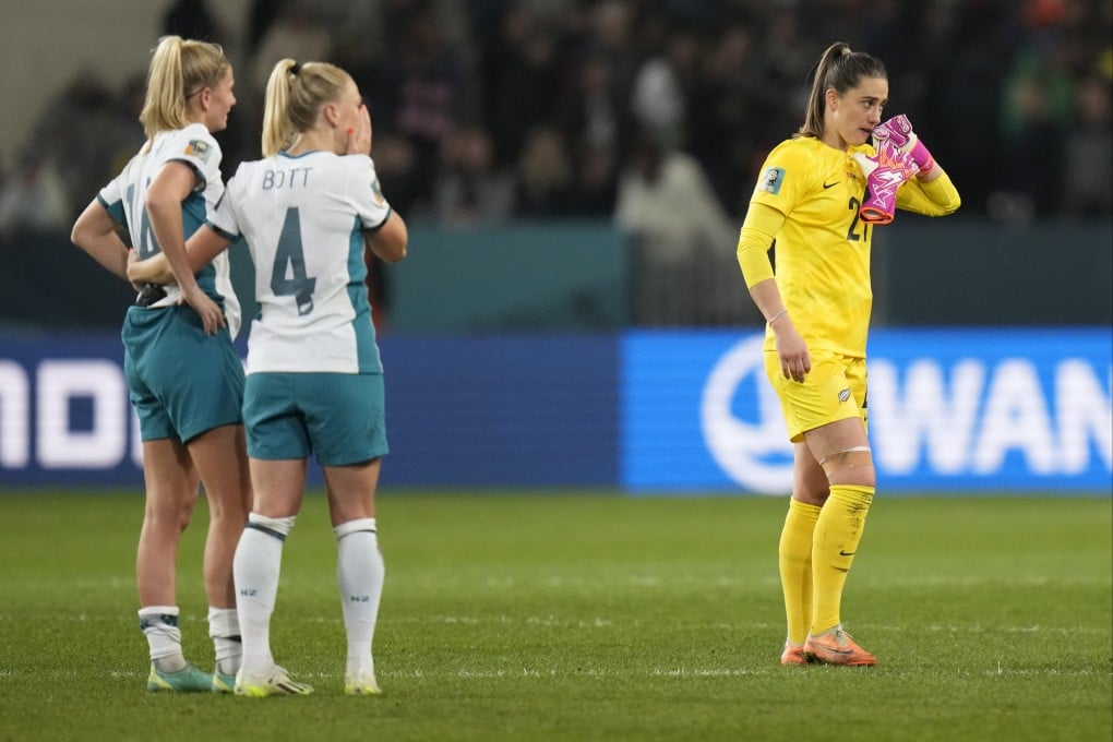 New Zealand players stand dejected after their goalless draw with Switzerland in Dunedin. Photo: AP