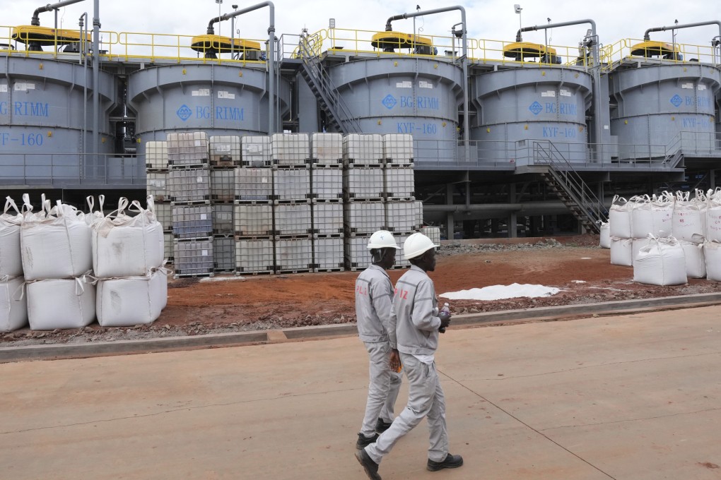 Workers walk past lithium-filled bags at Prospect Lithium Zimbabwe’s processing plant in Goromonzi, about 80km (50 miles) from the capital Harare, on July 5. China’s dominance of the global rare earth supply chain and other metals essential to the clean energy transition has led some to see deep-sea mining as an urgent matter of national security. Photo: AP