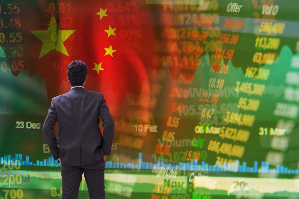 A businessman standing in front of China stock market ticker and prices. Photo: Shutterstock Images