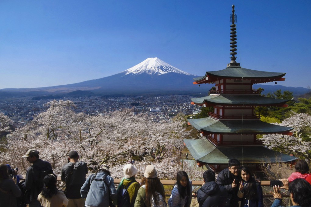 A view of Mount Fuji from a park in Tokyo. Cases of missing foreign travellers have raised questions about the seriousness of Japanese authorities to resolve such cases. Photo: Kyodo