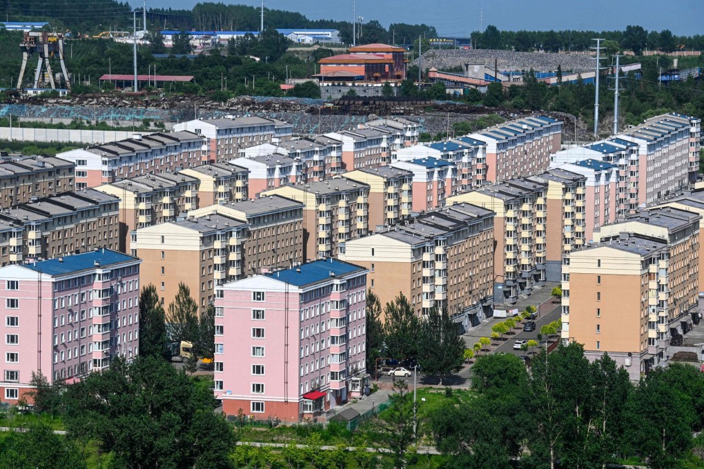 This photo taken on July 4, 2023 shows a general view of residential buildings in Hegang city in northeastern China’s Heilongjiang province. China’s real estate industry grew at lightning speed from the late 90s, and was a major component of the country’s turbocharged economic expansion. But with growth slowing and debts swelling, authorities cut off access to easy loans in 2020, pummelling the sector and causing a record-breaking slump last year. 
A wave of young Chinese are choosing to invest in dirt-cheap real estate in declining and remote industrial regions, ditching China’s modern, expensive metropolises. Photo: AFP