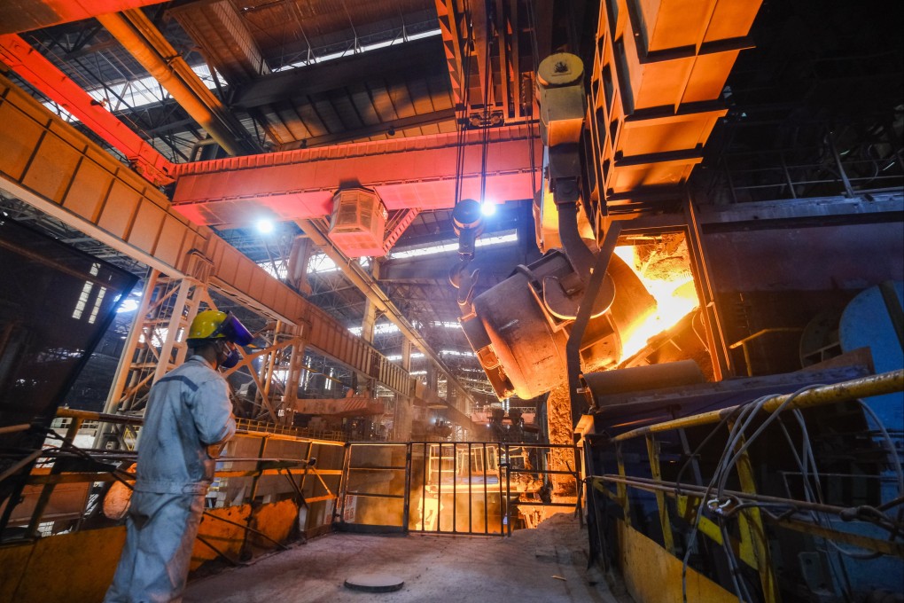 A staff member checks the operation of a steel furnace at a steel company in Xinfeng Town of Nanhu District, Jiaxing, Zhejiang Province, China, on January 26, 2023. Photo: EPA-EFE/Xinhua