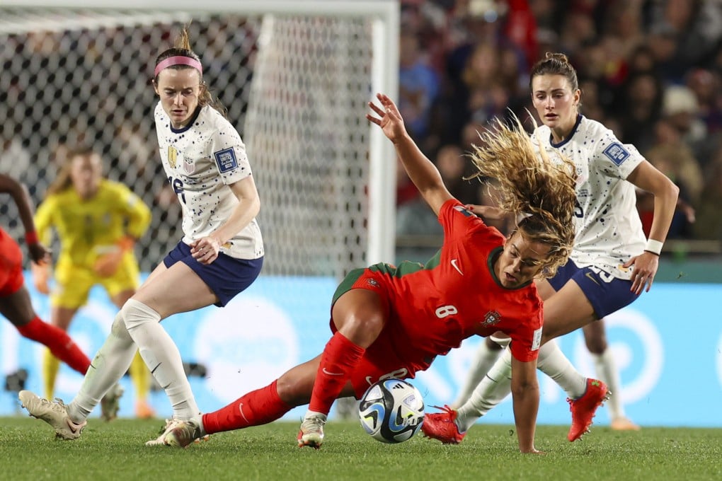 Portugal’s Andreia Norton (centre), controls the ball as United States’ Rose Lavelle (left) and Emily Fox watch during Group E match. Photo: AP