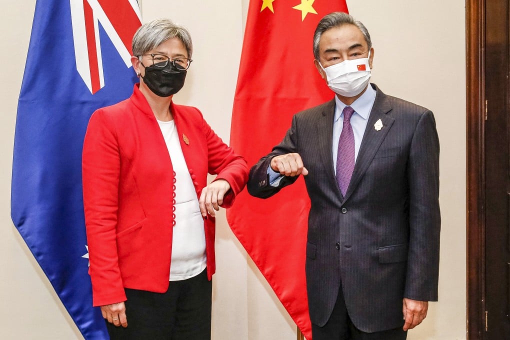 Australia’s Minister for Foreign Affairs Penny Wong with China’s Foreign Minister Wang Yi in July 2022. Photo: AFP