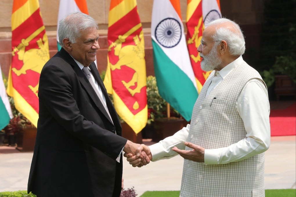 Sri Lankan President Ranil Wickremesinghe (left) shakes hands with Indian Prime Minister Narendra Modi during their meeting in New Delhi last month. Photo: EPA-EFE
