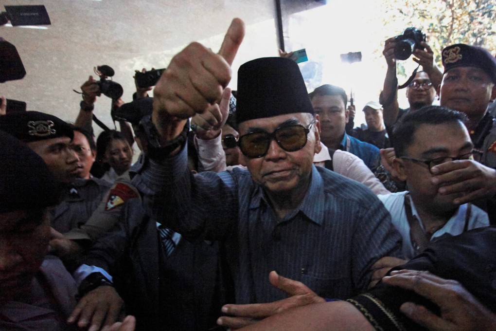 Leader of the Al Zaytun Islamic Boarding School, Panji Gumilang, arrives at the Indonesian Police Criminal Investigation Agency in Jakarta on August 1. Photo: Reuters