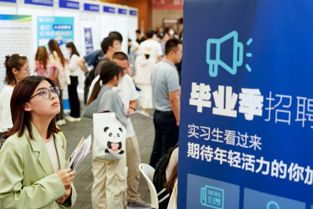 A Beijing job fair for university graduates on July 24. Disruptive innovations like AI are drivers of sustained economic growth, but they also destroy existing economic actors like specific industries, companies and jobs. Photo: Xinhua