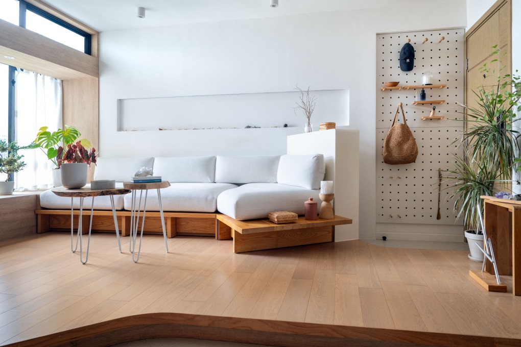 The living room of Daphne Ho’s redesigned 517 sq ft Hong Kong flat. A self-taught interior designer, she did such a good job on her own home that she has since started an interior-design business. Photo: by Eugene Chan