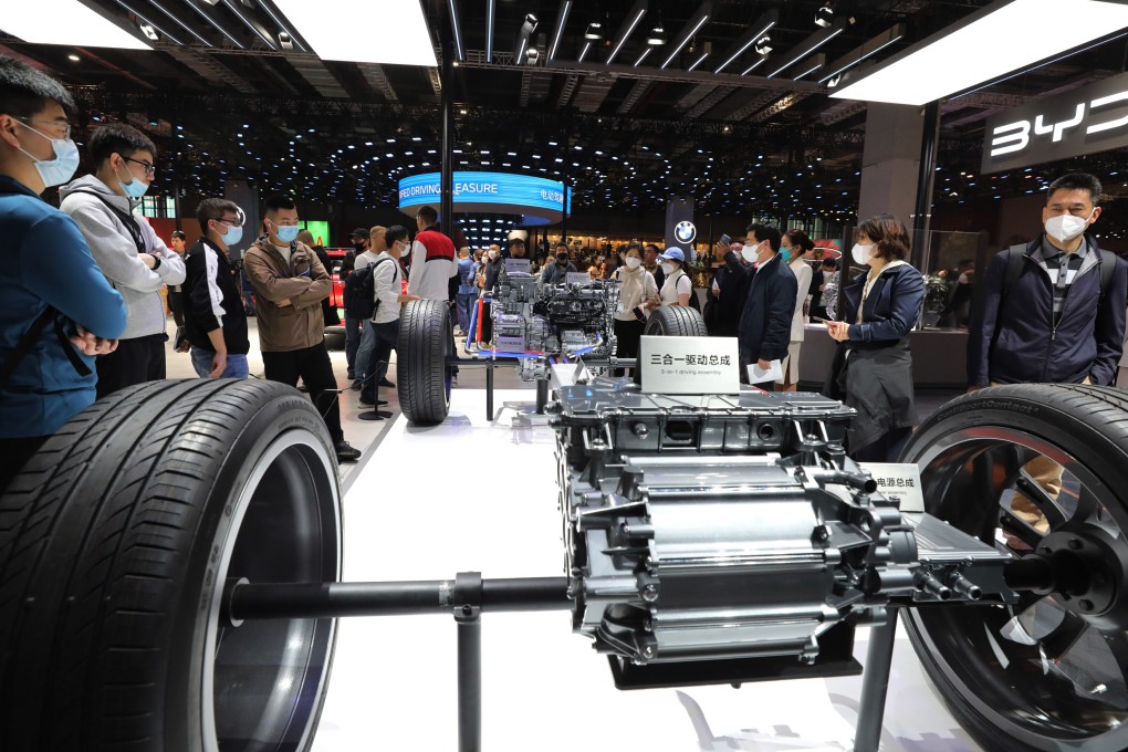 People view an electric-car chassis at a BYD booth during the 20th Shanghai International Automobile Industry Exhibition in Shanghai on April 24, 2023. Photo: Xinhua