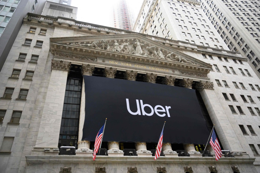 An Uber banner adorns the facade of the New York Stock Exchange ahead of the ride-sharing company’s initial public offering on May 10, 2019. Photo: AFP