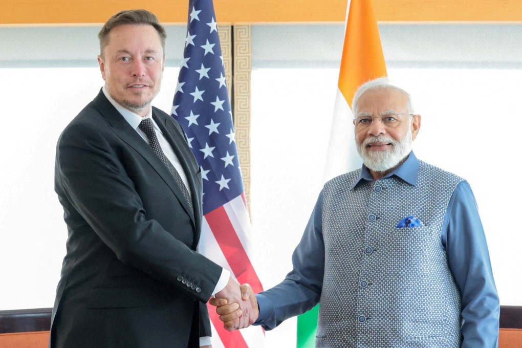 India’s Prime Minister Narendra Modi (right) shakes hand with Tesla boss Elon Musk during their meeting in New York City on June 20. Photo: PIB/Reuters