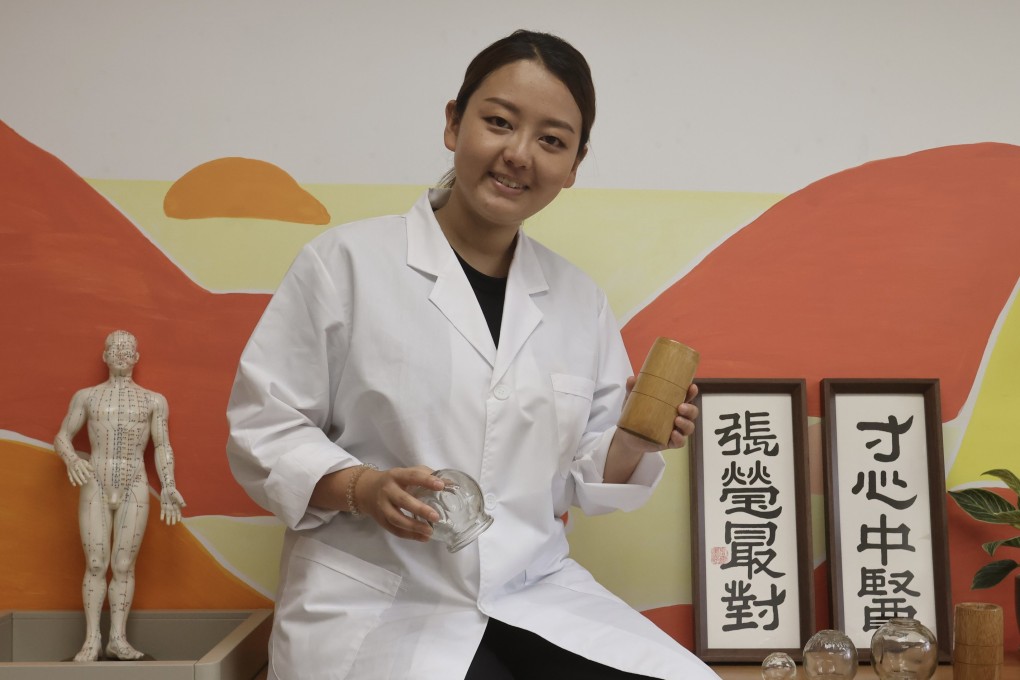 Traditional Chinese medicine practitioner Jasmine Cheung at her practice in Prince Edward, Hong Kong. She says she has seen a growing number of people come to her looking for relief from long Covid symptoms. Photo: Jonathan Wong