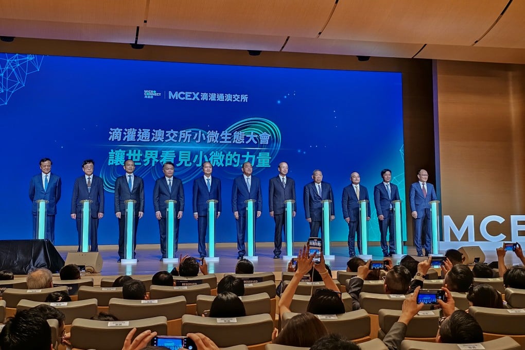 Micro Connect founding chairman Charles Li Xiaojia (far left), Macau Secretary for Economy and Finance Lei Wai-nong (fourth from left) and Macau Chief Executive Ho Lat-seng (sixth from left) hosted the launch ceremony of Micro Connect Macau Financial Assets Exchange at Galaxy International Convention Centre in Macau on August 3, 2023. Photo: Enoch Yiu