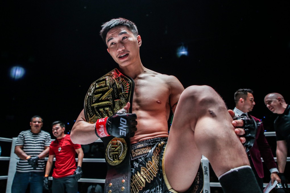 Tawanchai celebrates after retaining his ONE featherweight Muay Thai title against Jamal Yusupov in Bangkok. Photos: ONE Championship