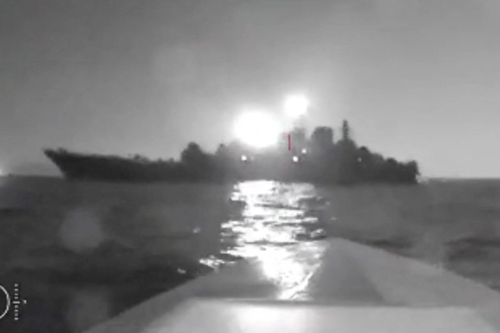 A sea drone shows the silhouette of Olenegorsky Gornyak ship near the port of Novorossiysk, Russia, in this screengrab obtained from social media video released on August 4, 2023. Photo: Reuters