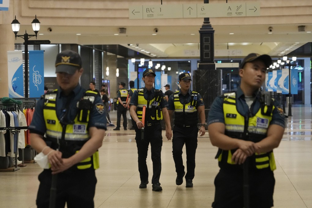 Police officers patrol a subway station in Seongnam, South Korea, on Thursday. Photo: AP