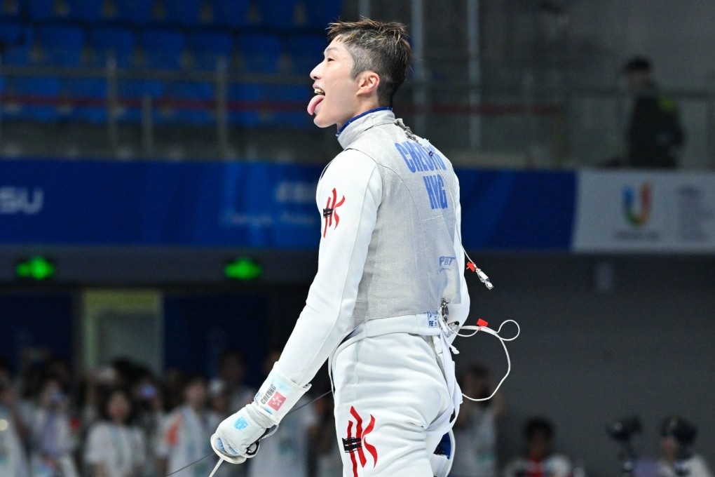 Cheung Ka-long with his signature celebration after winning the foil individual gold medal at the World University Games in Chengdu. Photo: USFHK