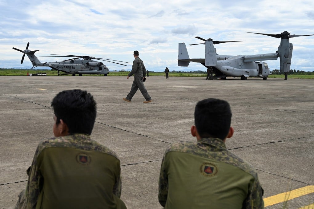 Filipino soldiers stand guard next to US aircraft in Cagayan, Philippines. Beijing’s maritime aggression in the South China Sea has prompted Manila to deepen ties with Washington. Photo: EPA-EFE