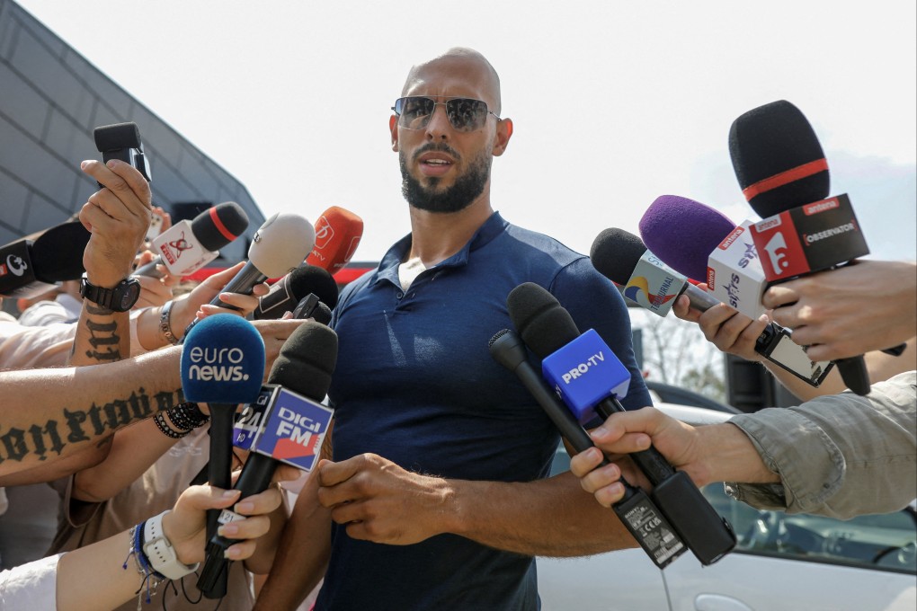 Andrew Tate outside his house in Voluntari, Ilfov, Romania. Photos: Reuters