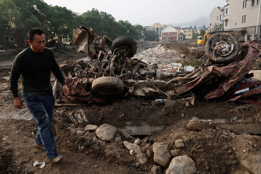 Flooding from Typhoon Doksuri leaves a trail of damage in Beijing’s Mentougou district. Photo: Reuters