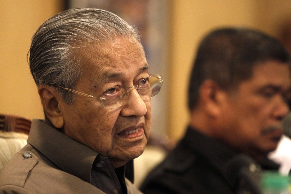 Mahatir Mohamad, now 98, speaks at a press conference in 2018, while he was prime minister. Photo: AP