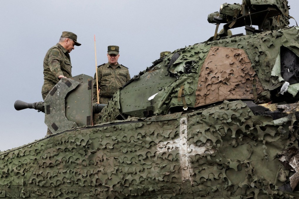 Russian Defence Minister Sergei Shoigu inspects an infantry fighting vehicle abandoned by Ukrainian soldiers at an unknown location on August 4. Photo: Russian Defence Ministry / Reuters