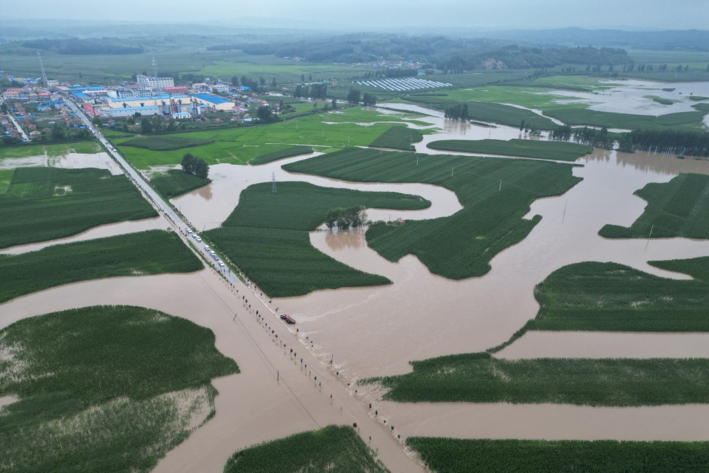 Floodwaters soak roads and fields in Kaiyuan township in Shulan, Jilin province on Friday. Photo: Xinhua