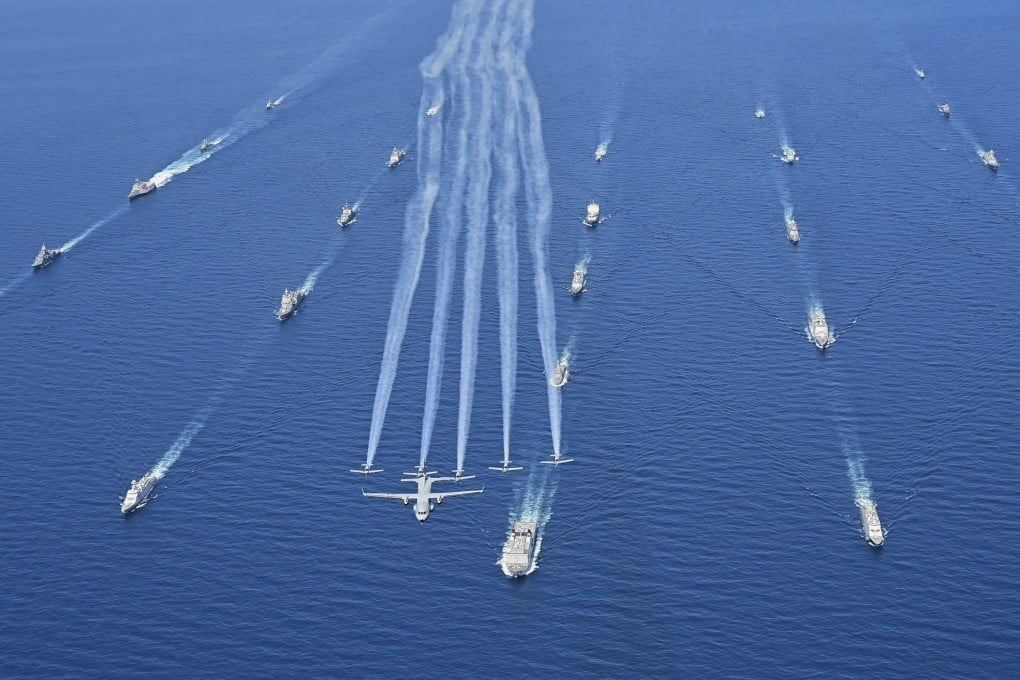 Indonesian aircraft fly past war ships sailing in formation during this year’s Komodo naval exercise that saw the navies of more than 30 countries take part. Indonesia has the No 4 most powerful navy in the world, according to the WDMMW ranking. Photo: AP