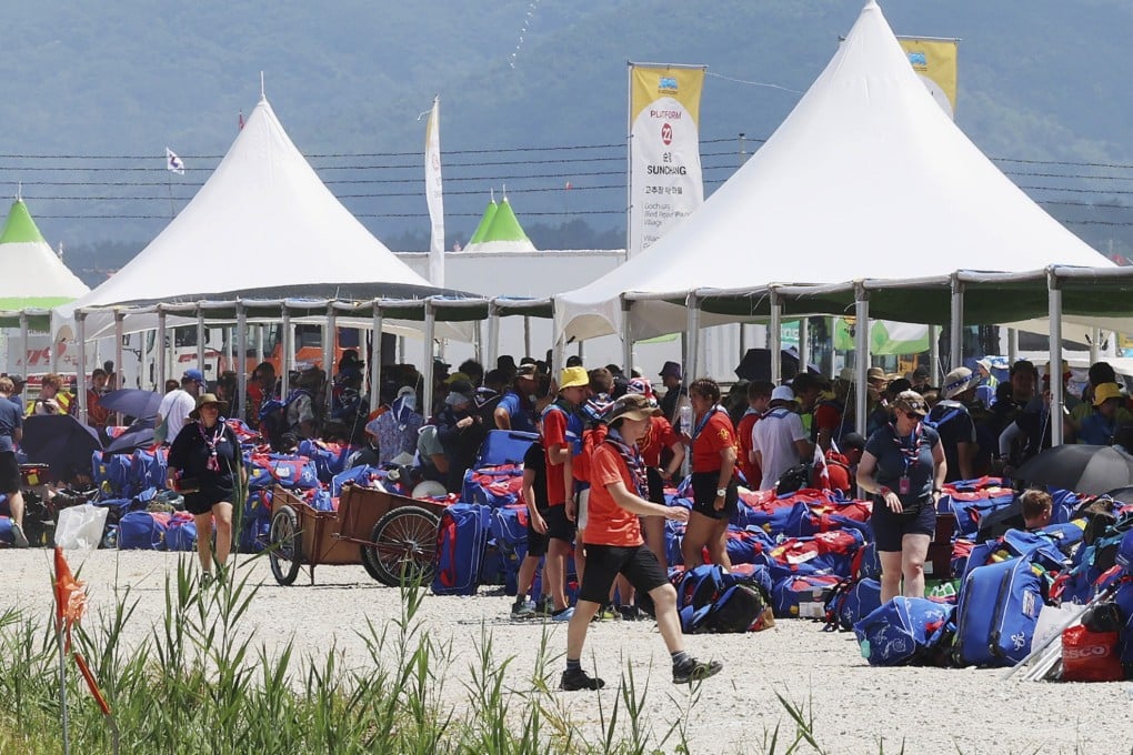 Delegates gather to leave the World Scout Jamboree campsite in Buan, South Korea. Photo: AP