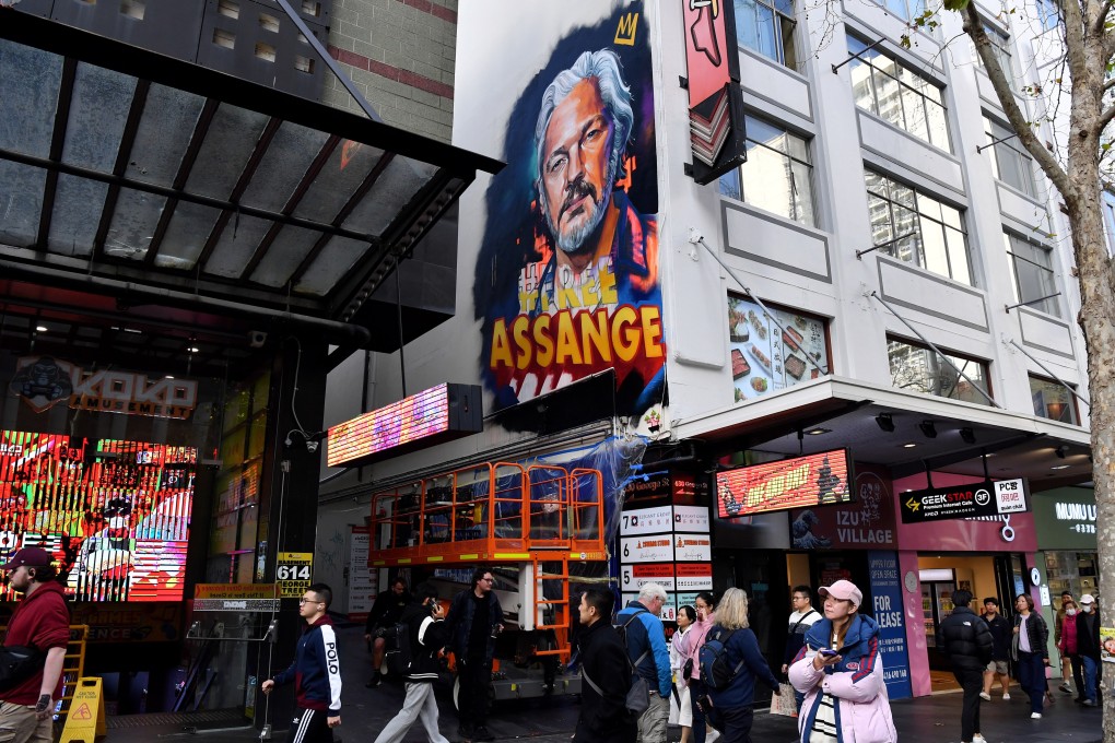A mural of Julian Assange is seen painted on the side of a building in Sydney last month. The Australian journalist has been imprisoned in Britain since April 2019 as the US government fights a legal battle to extradite him. Photo: EPA-EFE