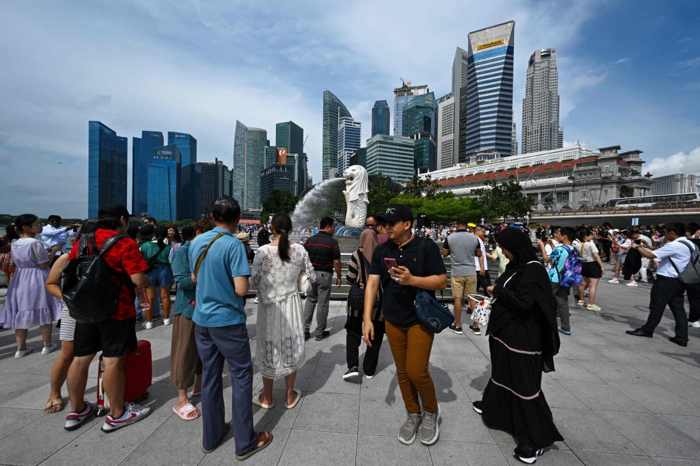 Tourists visit Merlion Park in Singapore last month. Dutch start-up Meatable plans to bring its cultivated meat products to the city state next year. Photo: AFP