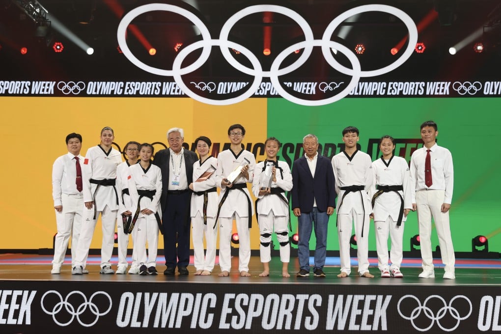 First-, second- and third-placed teams in the Virtual Taekwondo finals at the inaugural Olympic Esports Week, held at Suntec Singapore Convention Exhibition Centre in June. Photo: Getty Images
