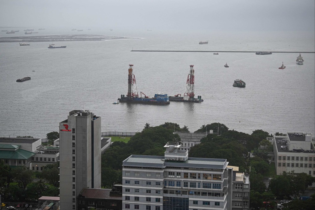 An aerial photo showing the US embassy complex (foreground) and the reclamation site (upper left) off Manila Bay. US diplomats have raised security and environmental concerns with the Philippines over the involvement of a Chinese company in a land reclamation project in Manila Bay. Photo: AFP