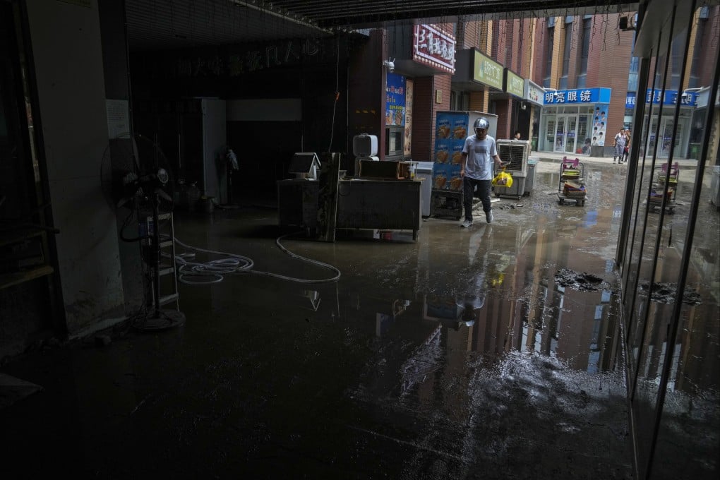 Muddy floodwaters in Beijing after Typhoon Doksuri brought record rainfall to the Chinese capital. Photo: AP