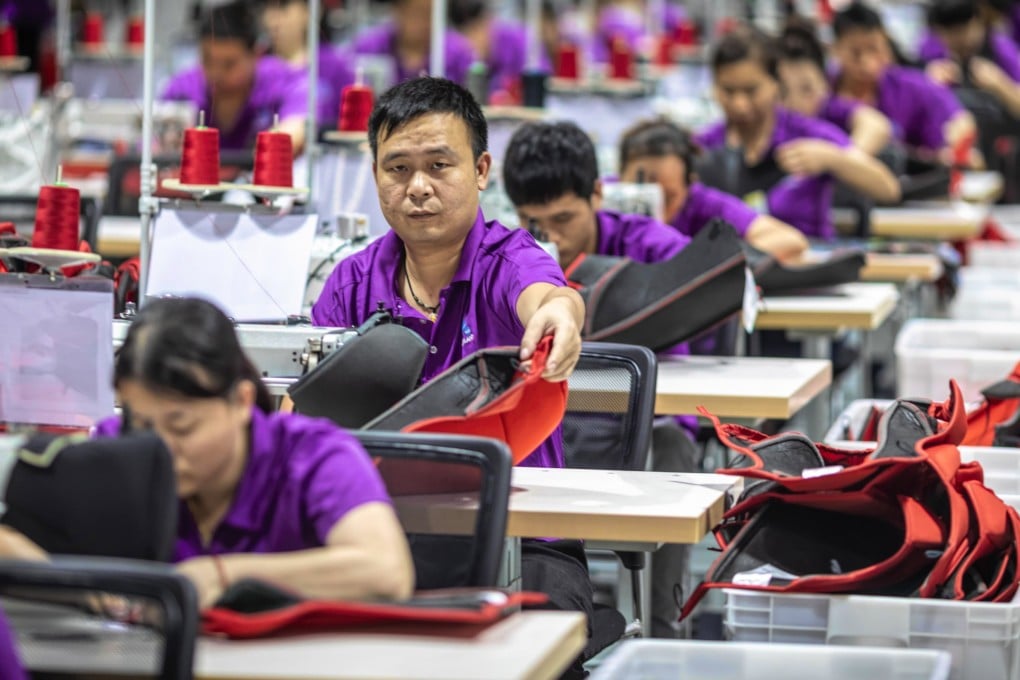Workers at a factory in China’s Guangdong province. The average age of the typical Asian factory worker has been increasing in recent decades. Photo: EPA-EFE