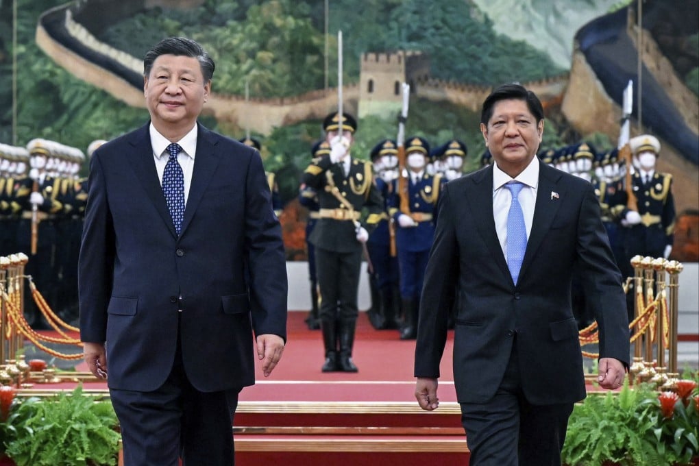 Visiting Philippine President Ferdinand Marcos Jnr, right, walks with President Xi Jinping in Beijing in January. Photo: AP
