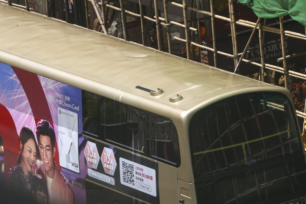 A chunk of concrete hit a bus in Mong Kok on Tuesday. Photo: Edmond So