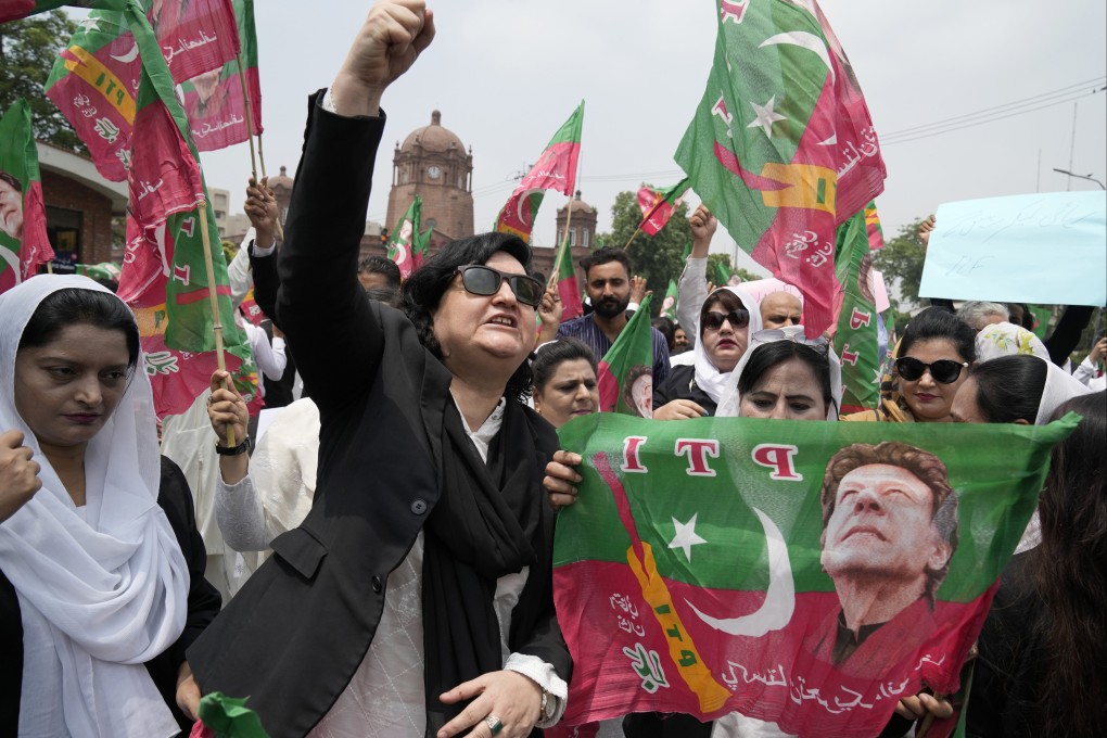 Supporters of former Pakistan prime minister Imran Khan hold a protest against Khan’s imprisonment in Lahore, Pakistan, on August 7. Khan has been jailed for three years after being convicted of corruption. Photo: AP