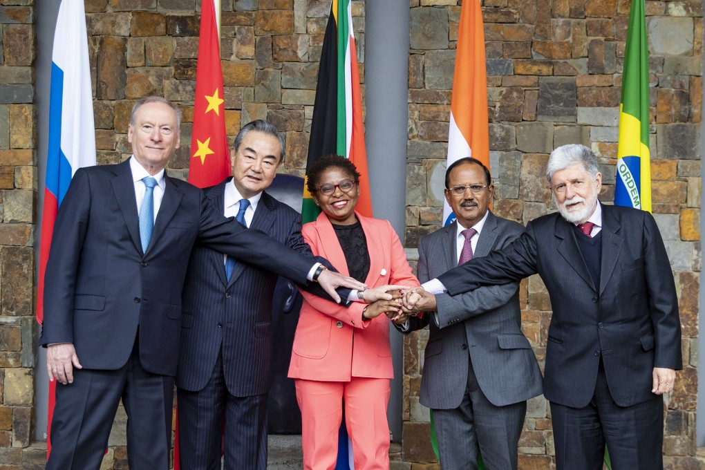 (From left to right) Celso Luiz Nunes Amorim, chief adviser of the presidency of Brazil,  Wang Yi, China’s top diplomat and foreign minister,  Khumbudzo Ntshavheni, minister in the presidency of South Africa, Ajit Doval, Indian national security adviser, and Nikolai Patrushev, secretary of the Security Council of Russia, at the 13th meeting of BRICS national security advisers and high representatives on national security in Johannesburg, South Africa, on July 25. Photo: Xinhua
