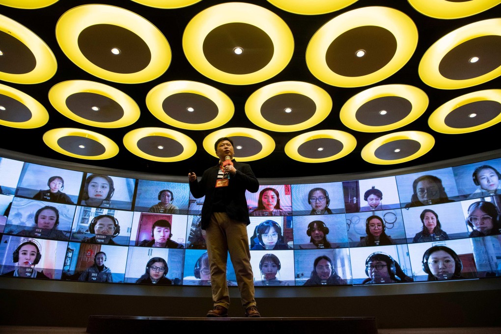 Wang Guanxin of the ITutorGroup instructs teachers how to tutor online in Shanghai in the file photo from February 2020. Photo: AFP
