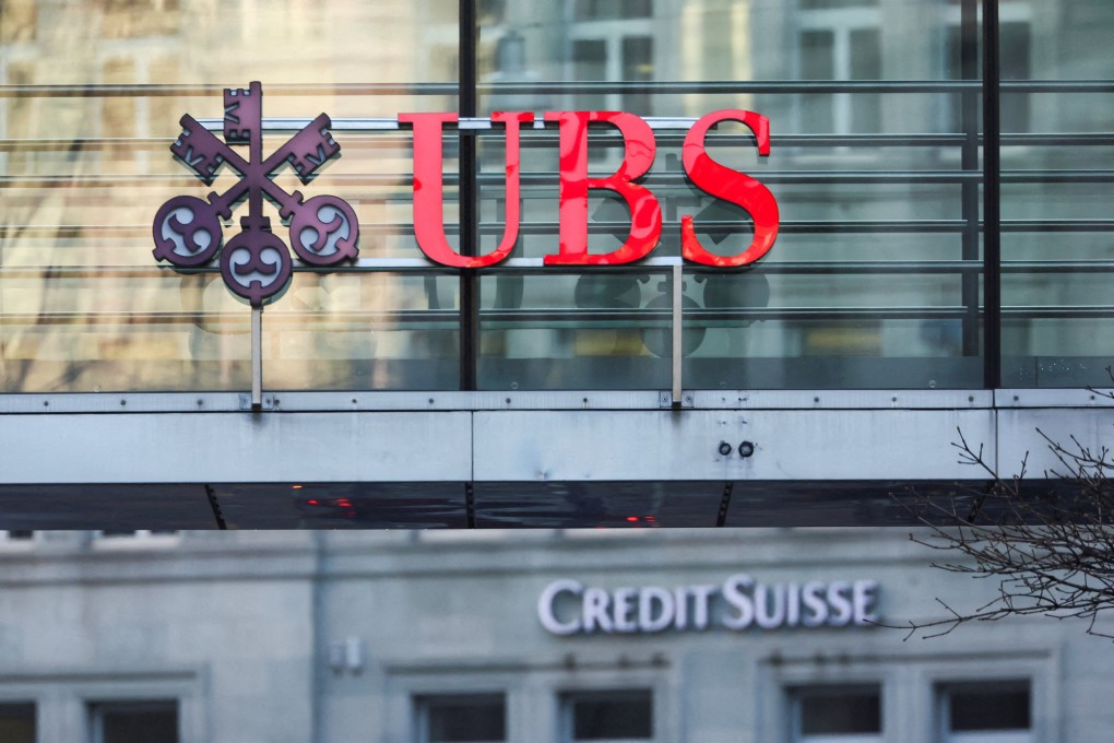 The logos of Swiss banks UBS and Credit Suisse in Zurich, Switzerland. Photo: Reuters
