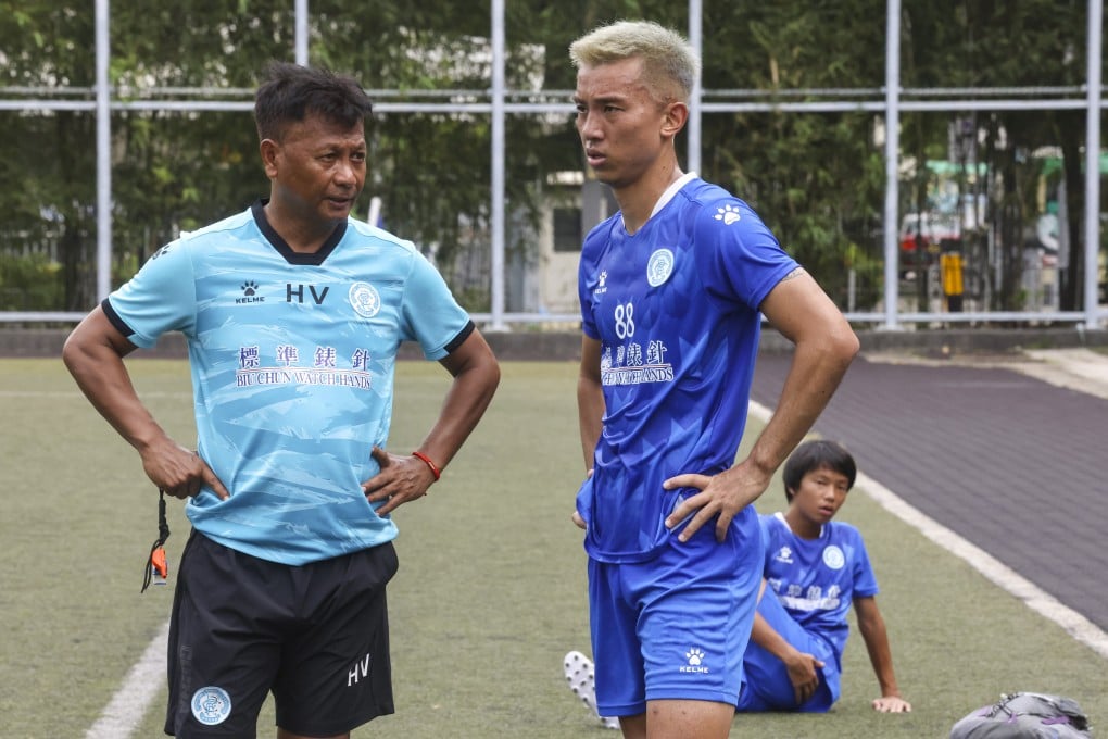 BC Rangers coach Henry Vom discusses tactics with defender Li Ngai-ho at a training session ahead of Tuesday’s clash with Haiphong. Photo: Jonathan Wong