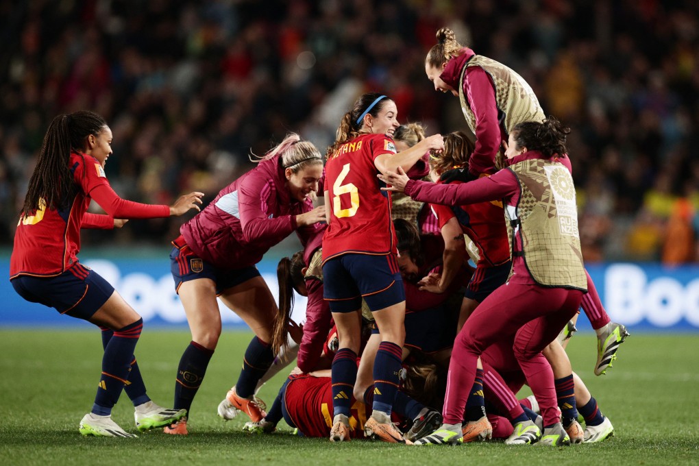Spain’s Olga Carmona is mobbed by teammates after scoring her side’s winner against Sweden. Photo: Reuters