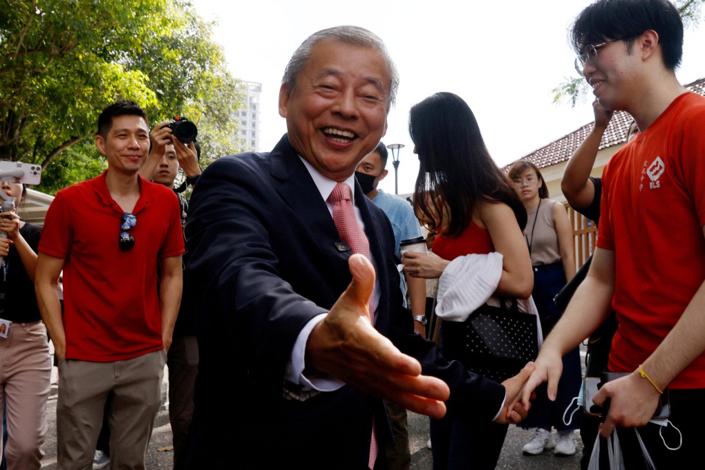 George Goh greets supporters in Singapore earlier this year. If elected, the presidential hopeful says he also intends to raise S$1 billion (US$737 million) for welfare organisations and small charities that are less recognised. Photo: Reuters