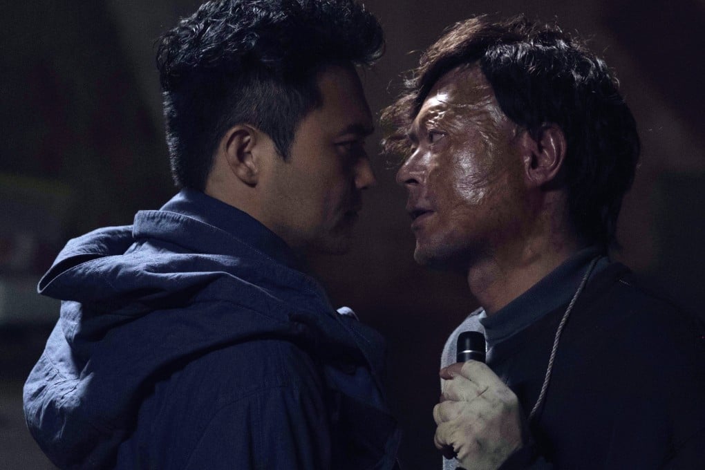 Julian Cheung (left) as police inspector Lo Fei and Louis Koo as the sole witness to an explosion that killed Lo’s fiancée and a fellow policeman in a still from “Death Notice” (category IIB, Cantonese), directed by Herman Yau. Francis Ng co-stars.