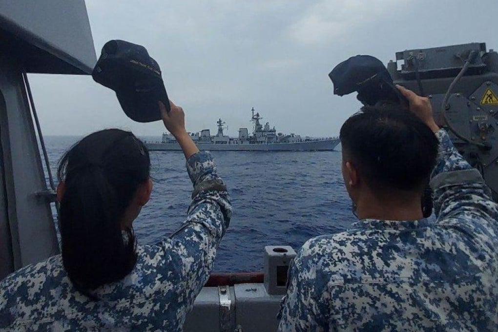 Singaporean sailors wave as India’s INS Delhi sails past Singapore’s RSS Supreme at the weeklong Asean-India Maritime Exercise earlier this year. Photo: Facebook / Singapore Navy