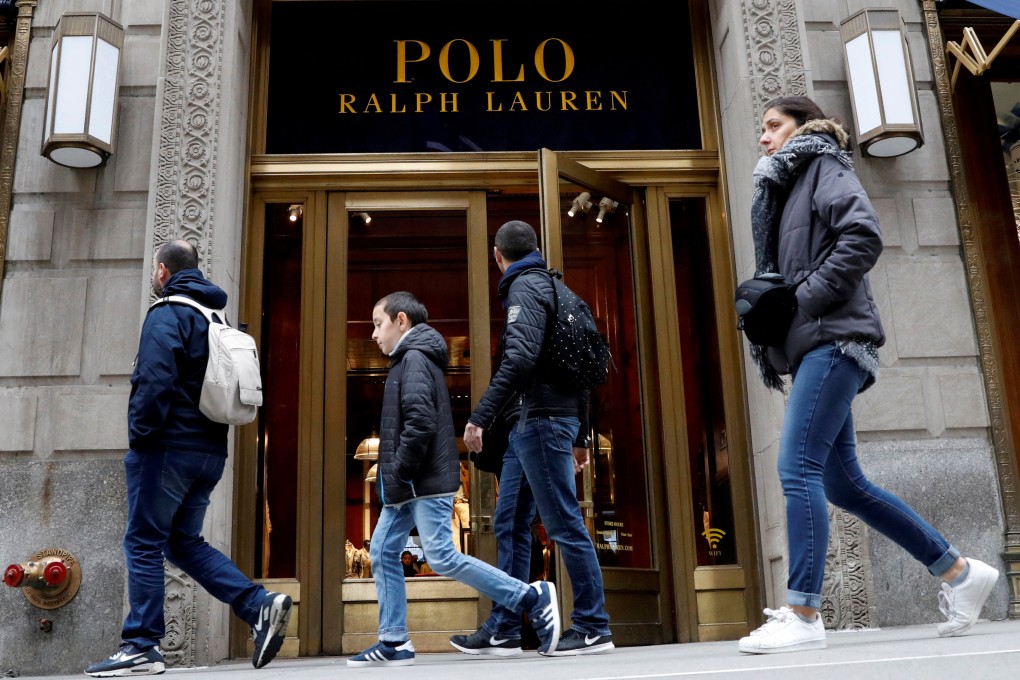 People walk past Ralph Lauren Corp’s  flagship Polo store on Fifth Avenue in New York in April 2017. Photo: Reuters
