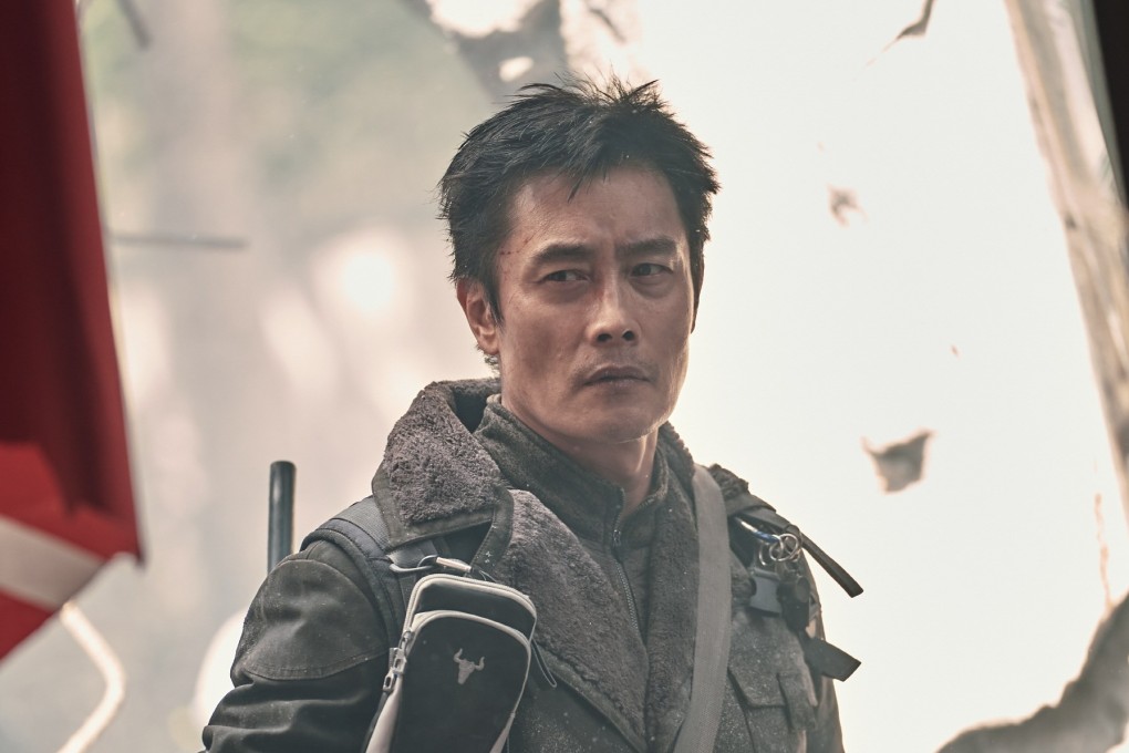Lee Byung-hun in a still from “Concrete Utopia”, a 2023 social satire uses a devastating earthquake as the trigger for a scabrous takedown of authoritarian rule, xenophobia, and Korea’s aspirational housing crisis.