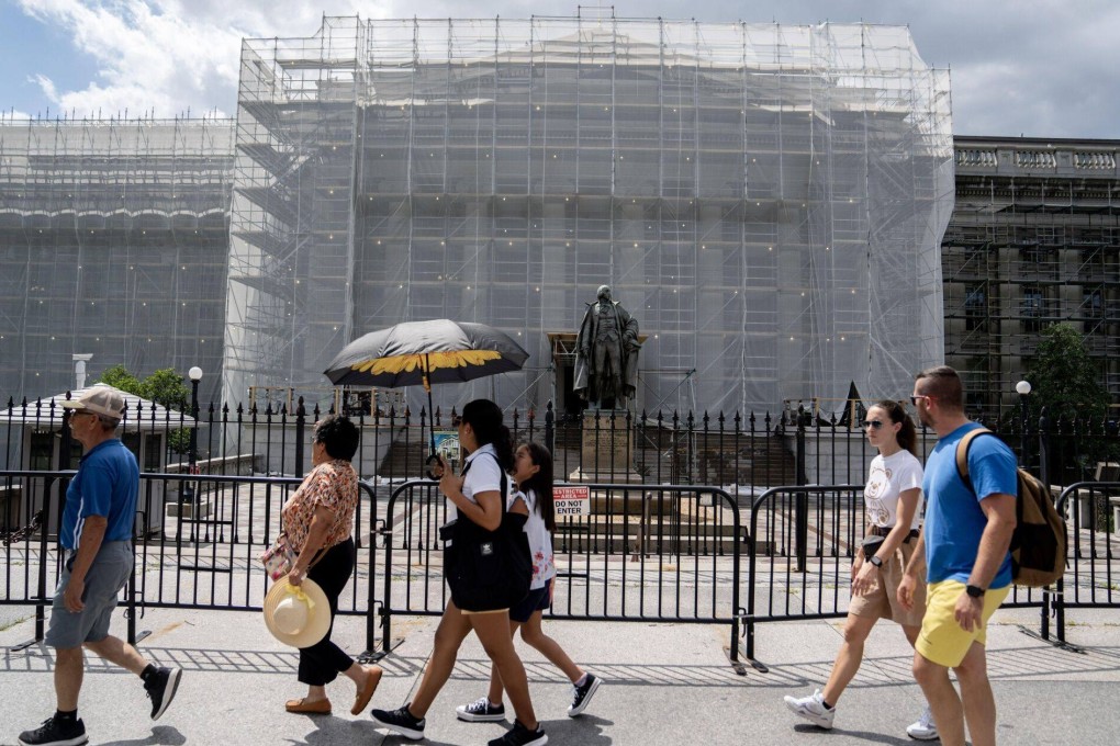 China cut its holdings of US Treasuries by US$11.3 billion to US$835.4 billion in June. Photo: Bloomberg